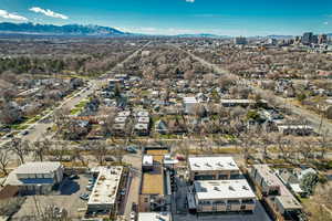 Aerial view of residential area featuring a mountain backdrop