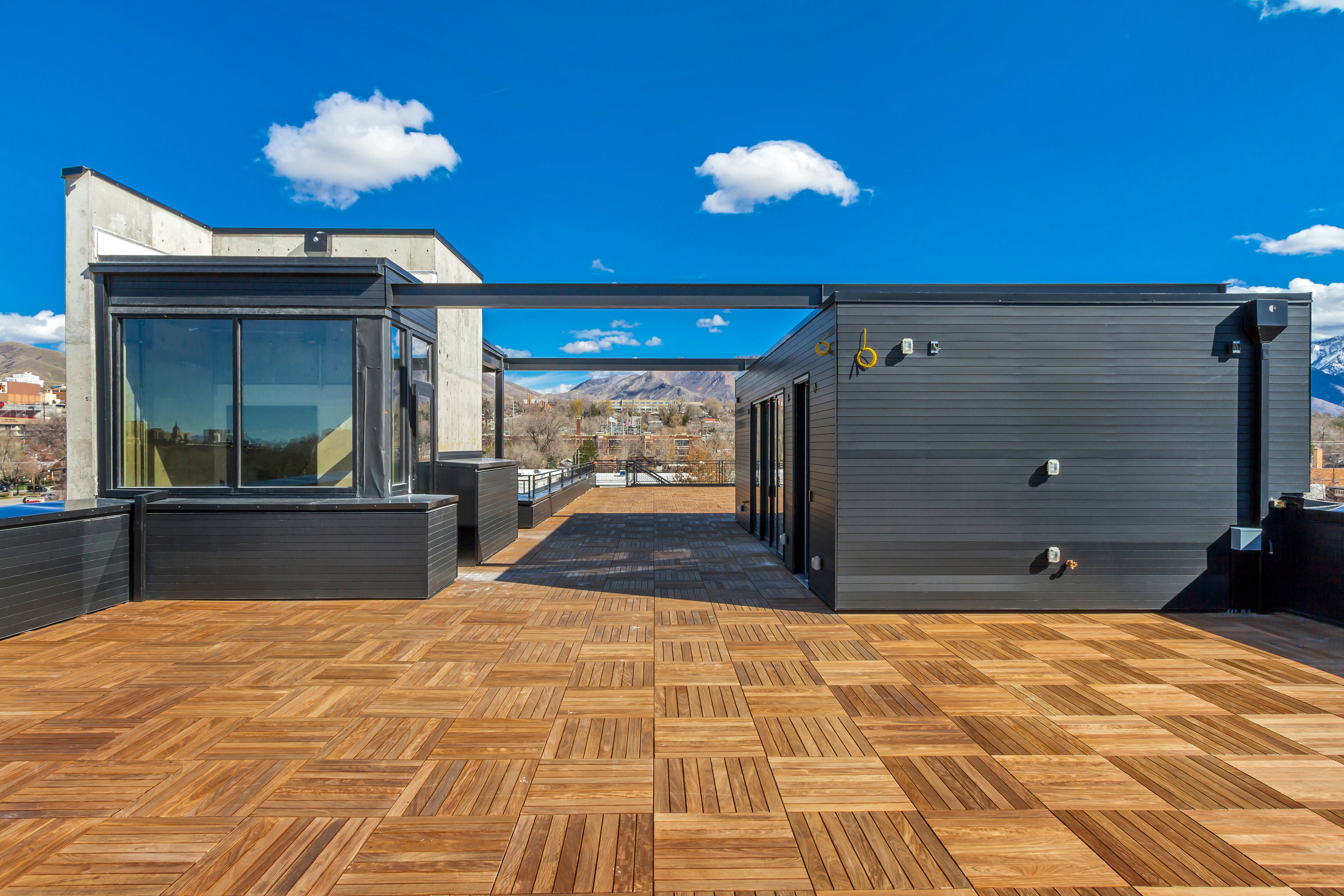 View of patio / terrace featuring a deck with mountain view