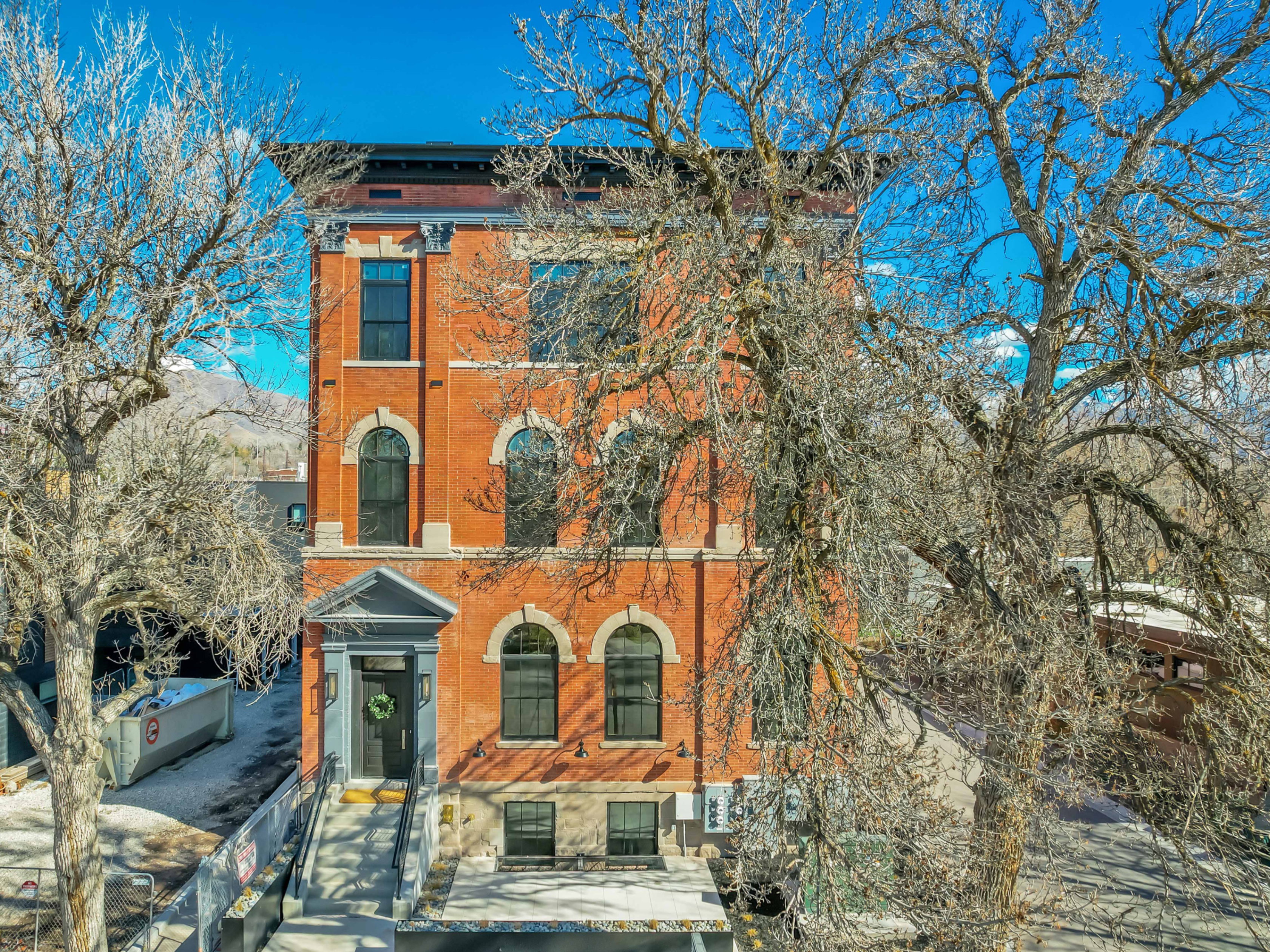 Italianate-style house with brick siding