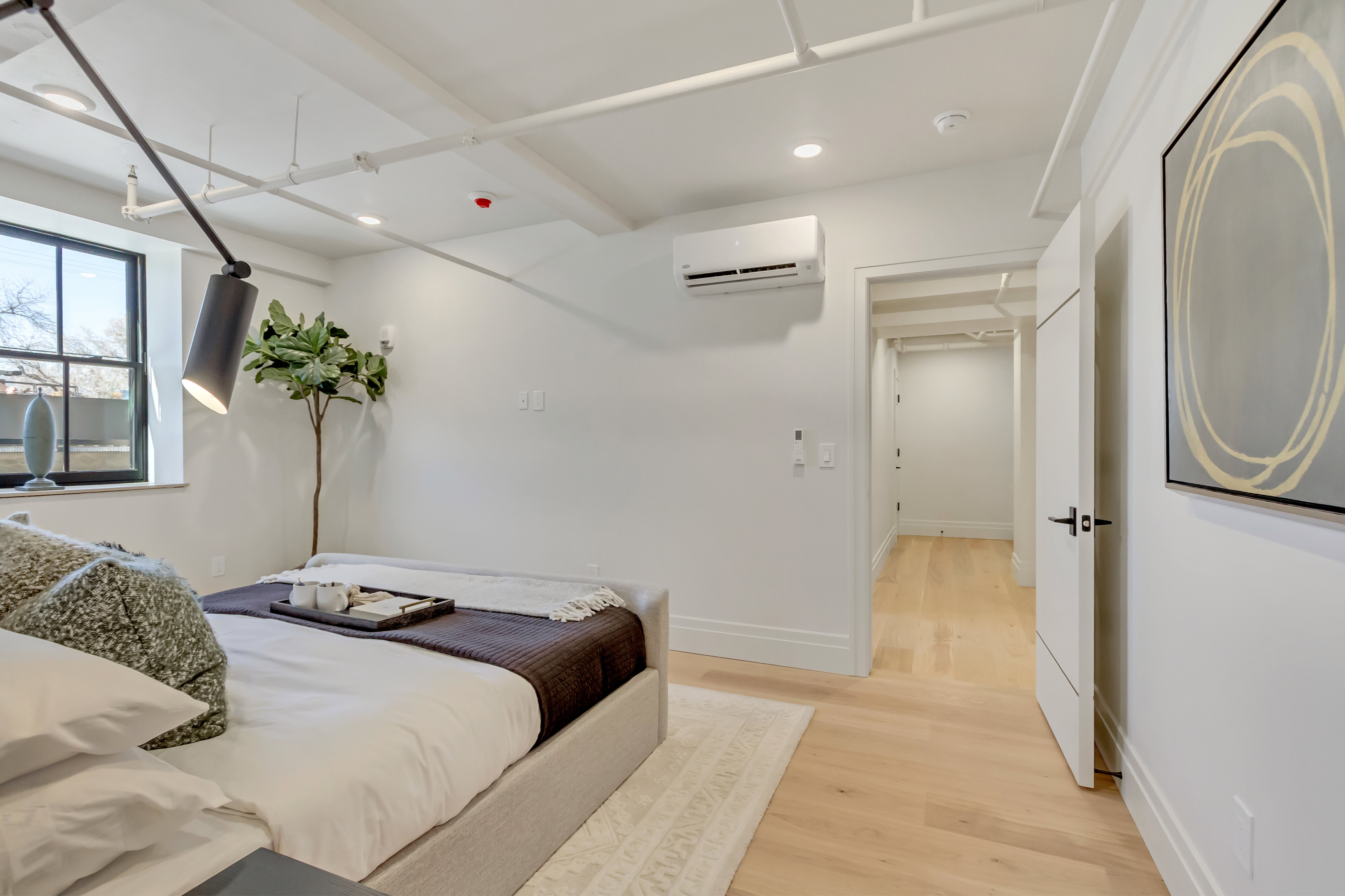Bedroom featuring light wood-style floors and recessed lighting
