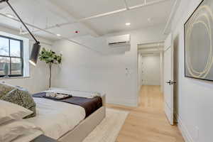 Bedroom featuring light wood-style floors and recessed lighting