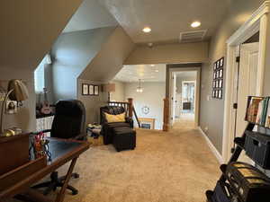 Office space featuring light carpet, plenty of natural light, recessed lighting, and ceiling fan