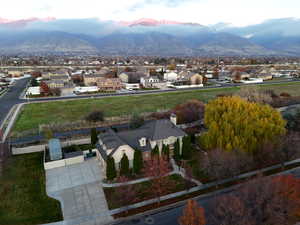 Aerial view of residential area with a mountainous background