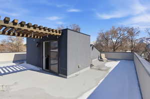 View of patio featuring a pergola