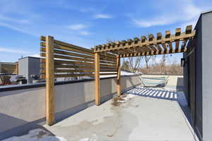View of patio / terrace with a pergola and a grill