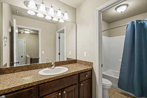 Full bathroom across from stairway