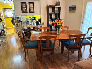 Dining space with light wood finished floors