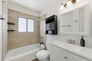 Full bathroom with vanity and  shower combination