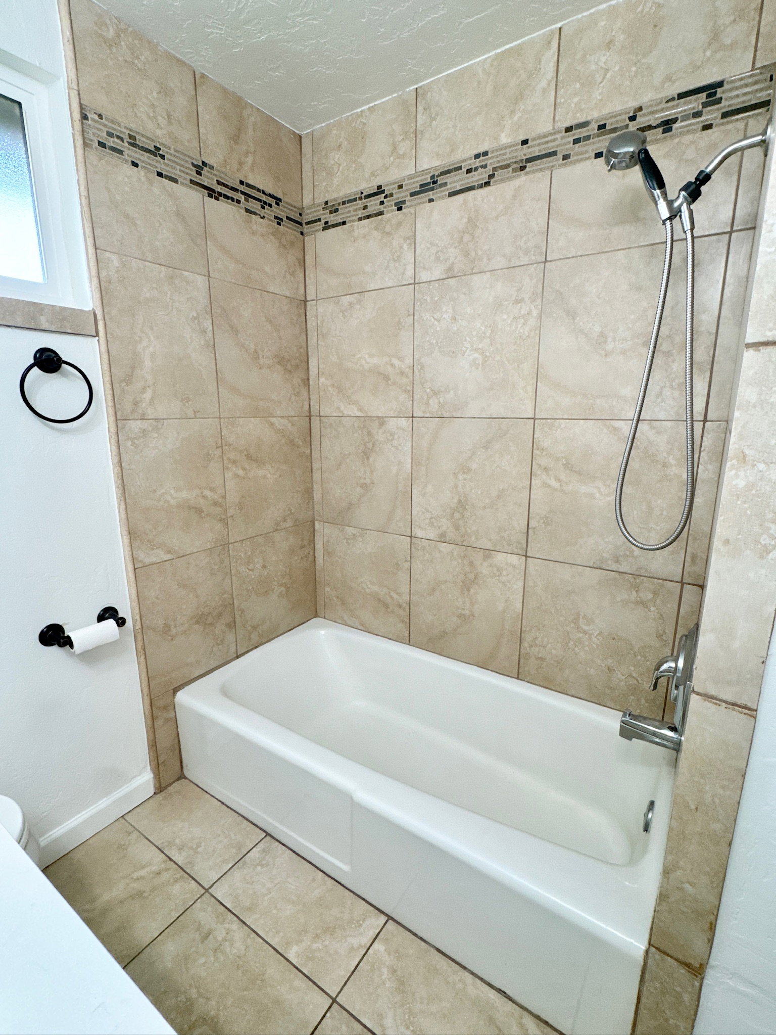 Full bathroom with shower / bathtub combination and tile patterned flooring