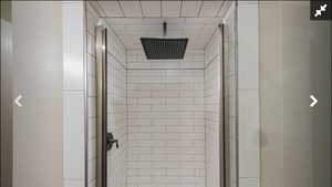 Bathroom featuring a shower stall