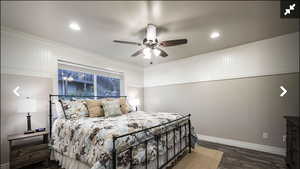 Bedroom with ceiling fan, dark wood-style flooring, and recessed lighting