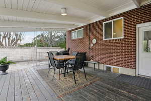 Wooden deck with outdoor dining space