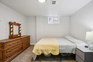 View of carpeted bedroom