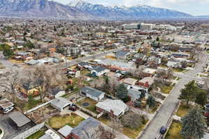 Aerial view of residential area featuring a mountain backdrop