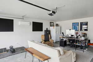 Oversized Office/Gym in the garage with electricity and minisplit.