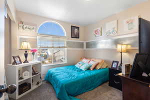 Bedroom featuring carpet floors