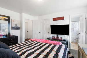 Bedroom with ensuite bath and a closet