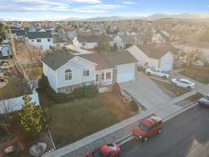 Aerial view of residential area with a mountain backdrop