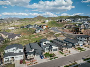 Aerial view of residential area with a mountain backdrop