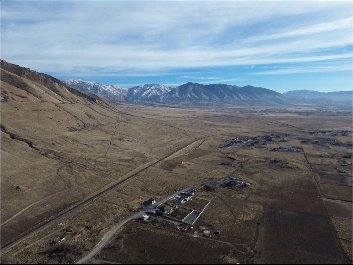 View of mountain backdrop featuring rural landscape and a desert landscape
