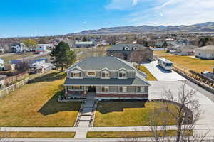 Aerial view of home and shop on 1 acre