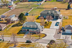 Aerial view of home and shop on 1 acre