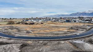 View of mountain background featuring nearby suburban area