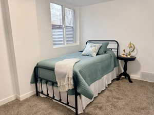 Bedroom with carpet