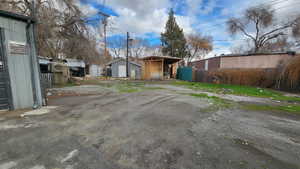 Exterior space with an outbuilding