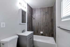 Full bathroom featuring vanity and tub / shower combination