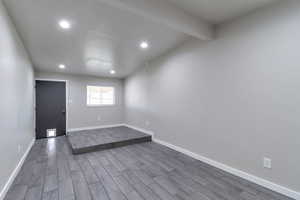 Unfurnished Office room featuring wood finish floors and recessed lighting