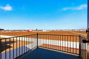 Wooden deck with a residential view