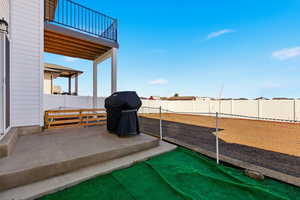 Patio / terrace featuring a grill, a fenced backyard, and a patio area