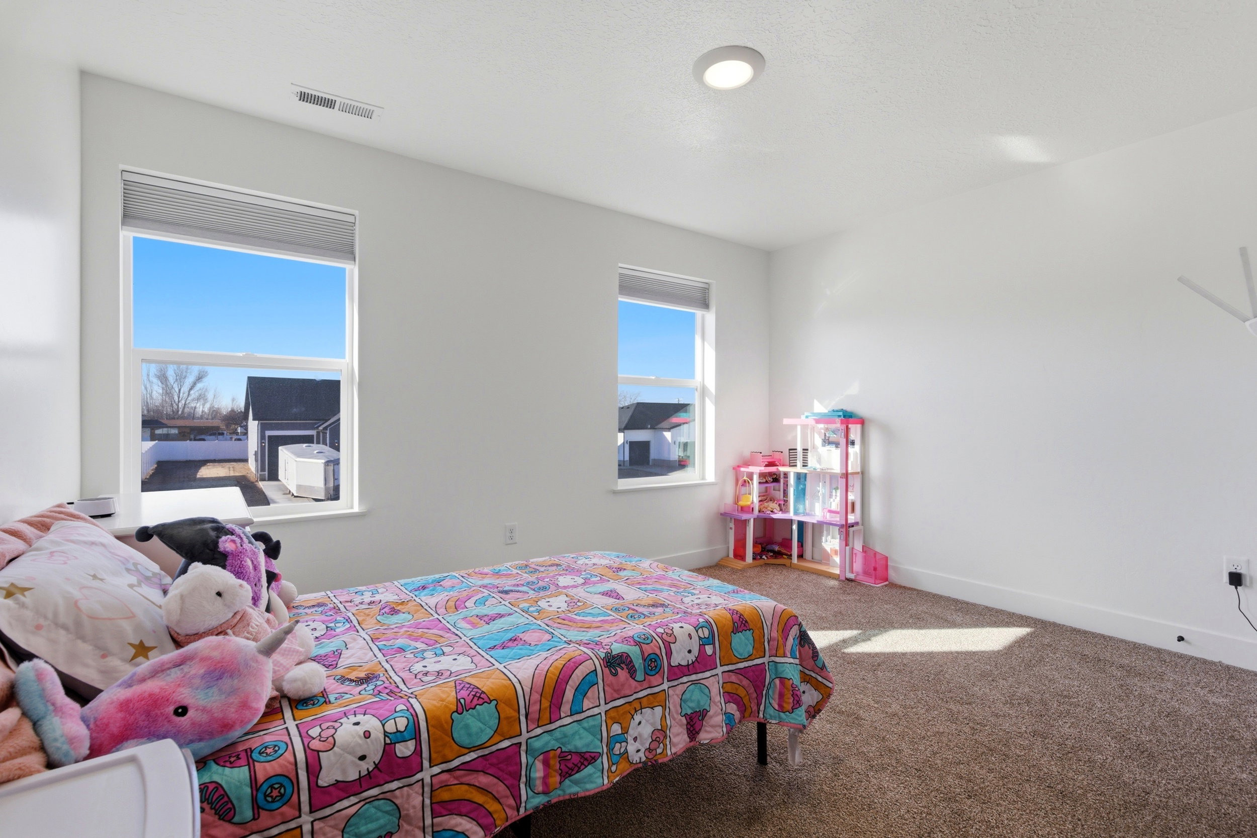 Bedroom with carpet flooring and baseboards