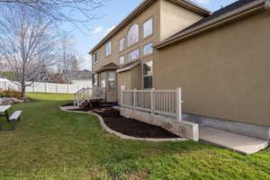 Back of property with stucco siding