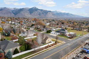 Aerial view of residential area with a mountainous background