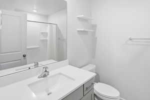 Bathroom featuring vanity and a shower with curtain