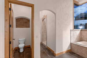 Primary full bathroom with a garden tub and walk in shower