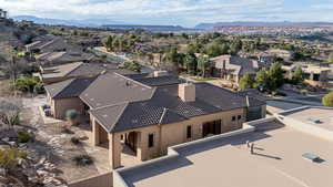 Aerial view of residential area featuring a mountain backdrop