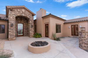 View of patio / terrace featuring an outdoor fire pit