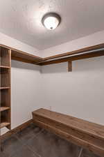 View of walk in closet to third bedroom downstairs
