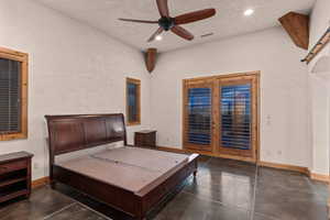 Primary Suite featuring concrete flooring, french doors, access to exterior, ceiling fan, and recessed lighting