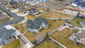 Aerial overview of property's location featuring nearby suburban area