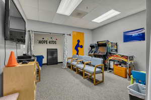 Game room featuring a paneled ceiling