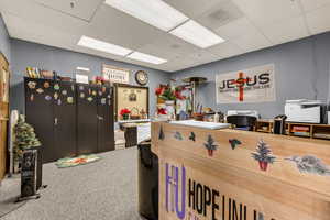 Reception featuring a drop ceiling