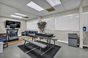 Interior space featuring a paneled ceiling
