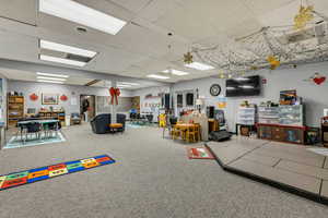 Miscellaneous room featuring a paneled ceiling