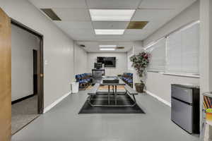 Office area featuring a drop ceiling