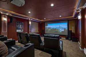 Theater room with a metal door. Metal was even installed in the walls to keep the sound contained.