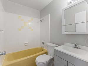 Full bathroom featuring vanity and shower / tub combination